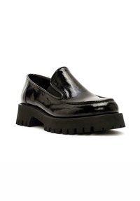 Scarpa slip-on in vernice nera con suola in gomma nera spessa e battistrada texturizzato. Punta tondeggiante e dettagli laterali elasticizzati.