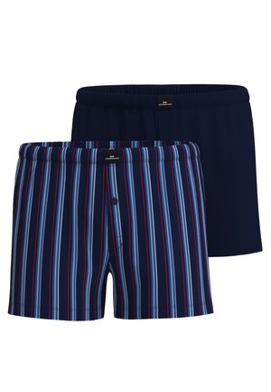 Two men's boxer shorts, one solid navy blue and one navy with red, white, and blue vertical stripes, both with elastic waistbands.