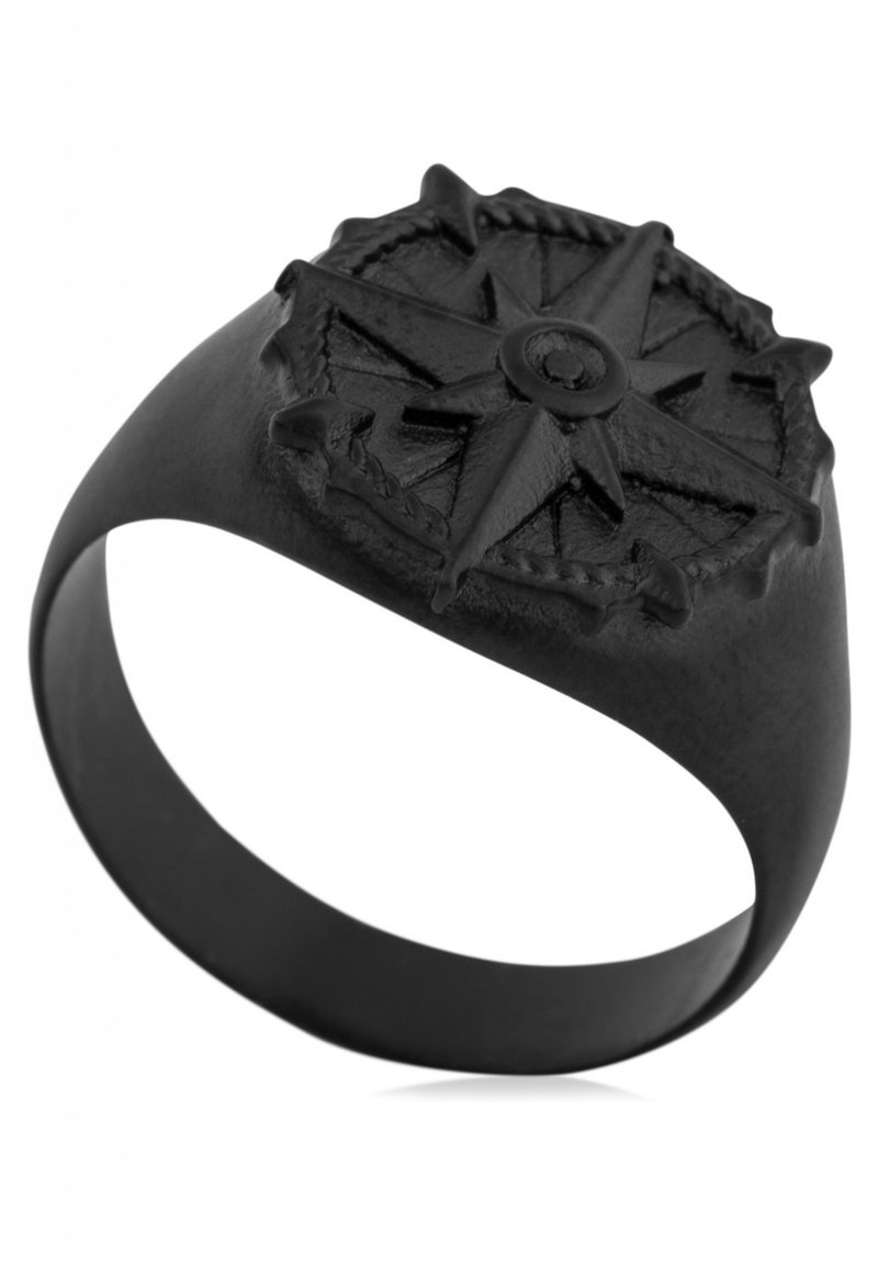 Black metal ring featuring a raised compass design, with intricate detailing and a smooth, matte finish on the band.