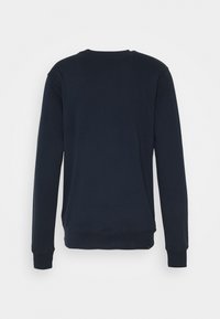 Navy blue sweatshirt with a crew neckline, long sleeves, ribbed cuffs and hem. Soft fabric with a smooth texture, no visible logos or patterns.