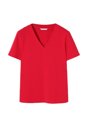 Punainen V-kaula-aukkoinen T-paita pehmeää puuvillaa. Lyhyet hihat ja rento istuvuus. Puhtaat saumat ilman näkyviä kuvioita tai yksityiskohtia.