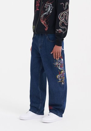BATTLE-DRAGON TATTOO  - Relaxed fit jeans - indigo