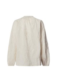 Blouse crème à manches longues avec broderie florale subtile, encolure froncée et poignets élastiques, vue de dos sur fond blanc.
