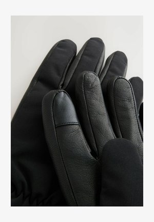 Mustad kindad, mis on valmistatud nahast ja pehmest, venivast materjalist. Disainis on sõrmed, millel on eraldatud osad ja siledad tekstuurid.