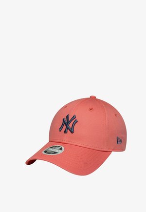 Coral baseball cap featuring a navy embroidered "NY" logo and a curved brim. Made from fabric with a smooth texture and round top.