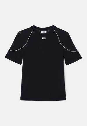 Black t-shirt made of cotton with short sleeves, features contrast white stitching along the shoulders and a round neckline.