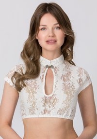Weißes Spitzen-Croptop mit kurzen Ärmeln, das über einen Ausschnitt mit Schlüsselloch und dekorativem Verschlussdetail verfügt. Zarte Blumenmuster sind sichtbar.