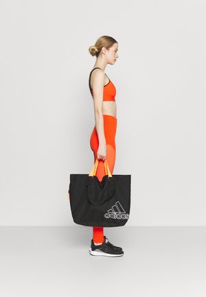 TOTE - Sports bag - black/white