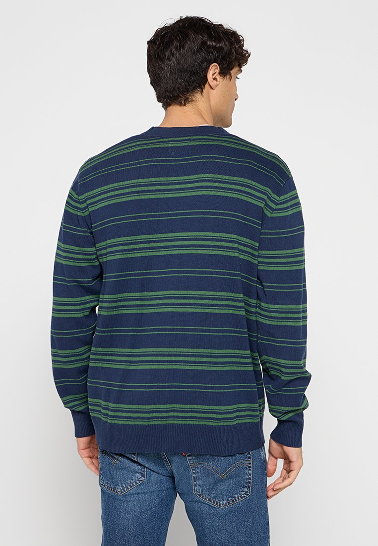 Marinesweater met groene horizontale strepen, ronde hals, geribbelde manchetten en zoom. Gemaakt van gebreide stof, geschikt voor casual kleding.