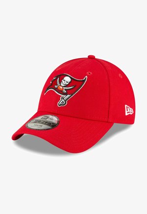 Red baseball cap with a curved visor, featuring an embroidered skull and crossbones logo. Made of fabric with a structured fit.