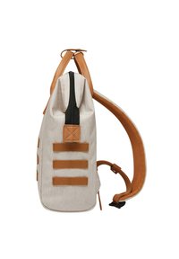 Backpack made of light beige fabric with brown leather accents, featuring a black zipper, and three horizontal webbing straps on the side.