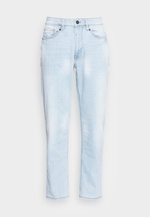 Light blue denim jeans with a straight leg design, faded wash, five pockets, and metallic button detailing at the waistband.