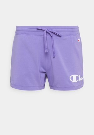 Pantalones cortos morados con cordón y logo de Champion en la pierna derecha y la cintura, mostrados sobre un fondo blanco.