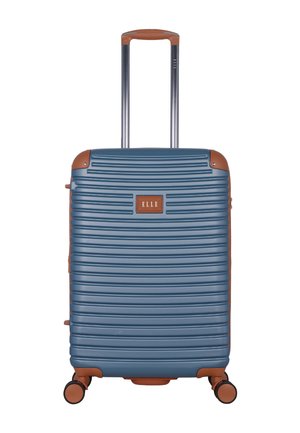Blue hard-shell suitcase with horizontal ridges, brown trim, four swivel wheels, telescopic handle, and front brand label reading "ELLE".