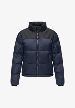 Jūrų laivyno puffer tipo striukė su juoda juostele ant pečių, pilnas užtrauktukas, apatiniai kišeniai ir elastingi raišteliai, pasižyminti siuvinėta tekstūra.