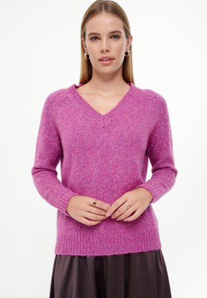 V-neck pink wool sweater with ribbed texture and long sleeves, featuring a slightly relaxed fit and hem.