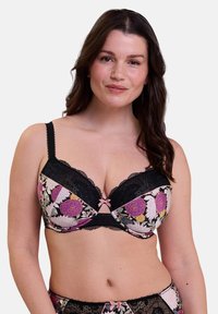Reggiseno in pizzo nero con motivo floreale in rosa, viola e crema. Presenta coppe con stecche, spalline regolabili e un piccolo fiocco al centro.
