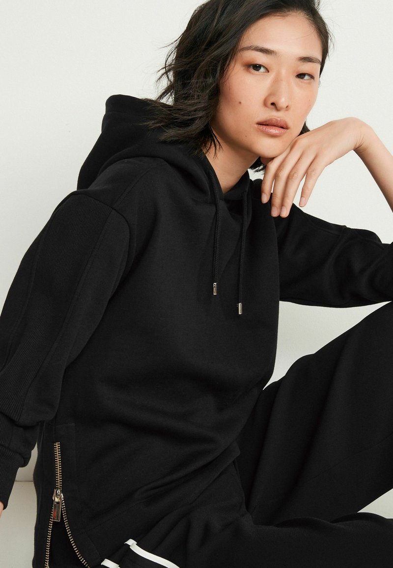 Damen Sweatshirts | Next PREMIUM Kapuzenpullover black/schwarz - SF62268 Damen Sweatshirts | Next PREMIUM Kapuzenpullover black/schwarz - SF62268