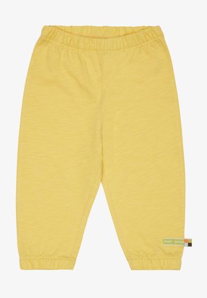 loud + proud SLUB MIT DRUCK ASTER - Pantaloni sportivi - gelb