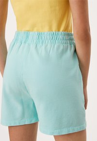 QS Pantaloni sportivi - mint