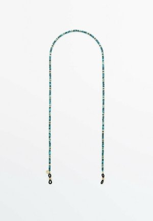 Blauw-zwart patroon brillenkettinkje met zwarte rubberen lussen en kleine goudkleurige metalen accenten aan elk uiteinde.