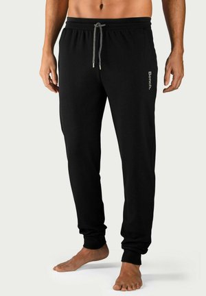 Pantalon de survêtement - schwarz