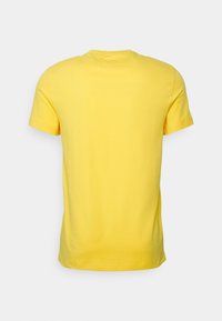 Tommy Hilfiger TOMMY LOGO TEE - T-shirt estampada - warm yellow