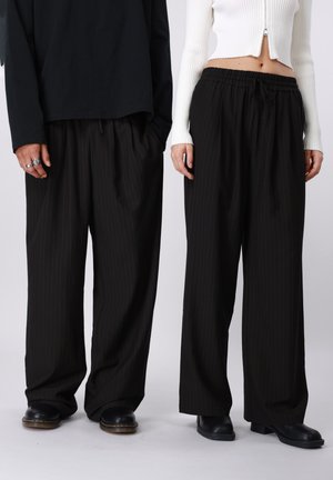 UNISEX - Jogginghose - black