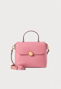 Pink leather handbag with a structured design, a top handle, and a detachable shoulder strap. Features a gold round clasp and textured finish.