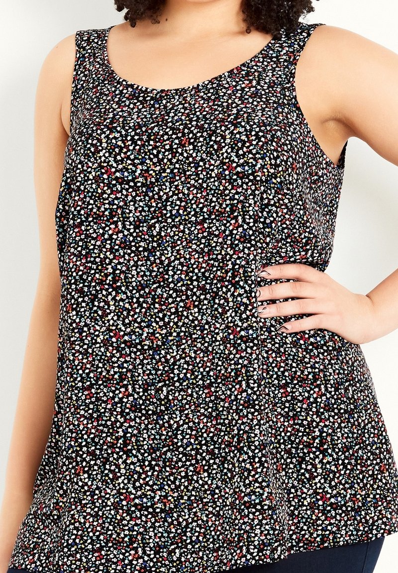 Floral-Tanktop in Schwarz mit kleinen weißen, roten und blauen Blumen. Leichter Stoff, ärmelloses Design, lockere Passform und runder Ausschnitt.
