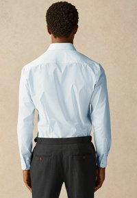 Next Krekls - blue print blue tie