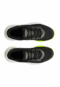Black athletic shoes with a mesh upper, gray accents, black laces, and a green reflective outsole. Features a padded collar and logo detail.