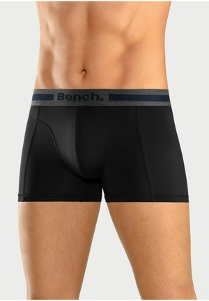 Schwarze Boxershorts aus Stretchmaterial mit einem grauen Bund, der das "Bench."-Logo in Marineblau trägt. Das Design umfasst Nähte für eine bessere Passform.