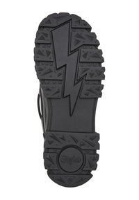 Semelle de chaussure noire avec grip texturé, motif éclair au centre et logo circulaire avec texte "Buffalo" près du talon, taille 38 marquée.