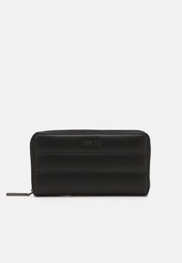 Calvin Klein LINE QUILT LARGE ZIP AROUND - Lompakko - black