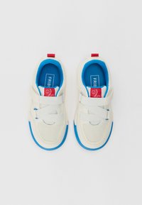 White and blue sneakers with a mesh upper, double strap closure, red accent on the heel, and a textured rubber sole.