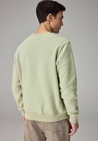 Next CREW - Melegítőfelső - light green