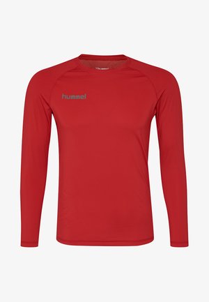 Red long-sleeve athletic shirt made of smooth fabric. Features crew neck, raglan sleeves, and a small gray logo on the chest.