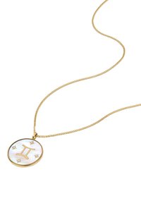 Collana con pendente dorato che presenta un medaglione circolare in madreperla con il simbolo dei Gemelli e sei piccoli dettagli a stella.