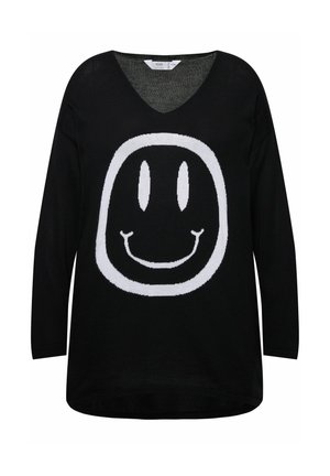 Black knitted sweater with a large white smiley face graphic, featuring a V-neck, long sleeves, and a slightly longer back hem.