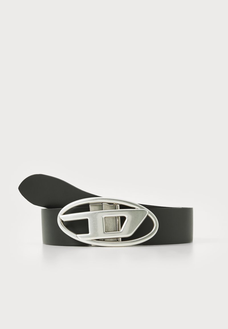 Black leather belt with a shiny silver oval buckle featuring a geometric design. The strap is smooth with a tapered end.