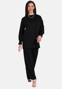 Modanisa SET - Bukser - black