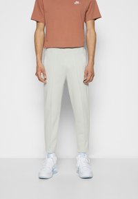 Nike Sportswear Träningsbyxor - silver-coloured