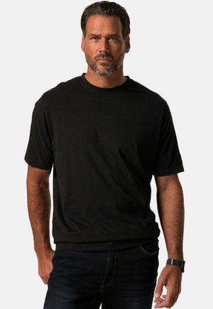 Black short-sleeve T-shirt made of cotton, featuring a round neck. The fabric appears smooth with a regular fit. Worn with dark denim jeans.