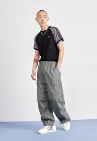adidas Originals RIVALRY UNISEX - Joggesko - core white/grey three/off white