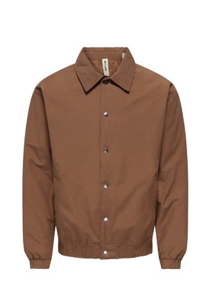 Pruun kerge jope kraega kaelusega, ees kinnituspadjanditega, elastsete varrukate ja äärega. Sile tekstuur, minimalistlik disain, nähtavaid mustreid ei ole.