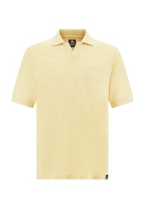 Rumena polo majica s kratkimi rokavi, rebrastim ovratnikom in žepom na levi strani prsnega dela. Ima mehko teksturo in ravno rob.