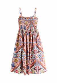Smocked Sommerkleid mit dünnen Trägern, ausgestattet mit einem bunten floralen und geometrischen Druck in Pink-, Rot-, Blau- und Grüntönen. Baumwollstoff.