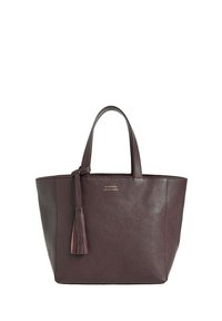 Sac en cuir marron foncé avec deux poignées et un détail de pampille suspendu à une des poignées, sur fond blanc.