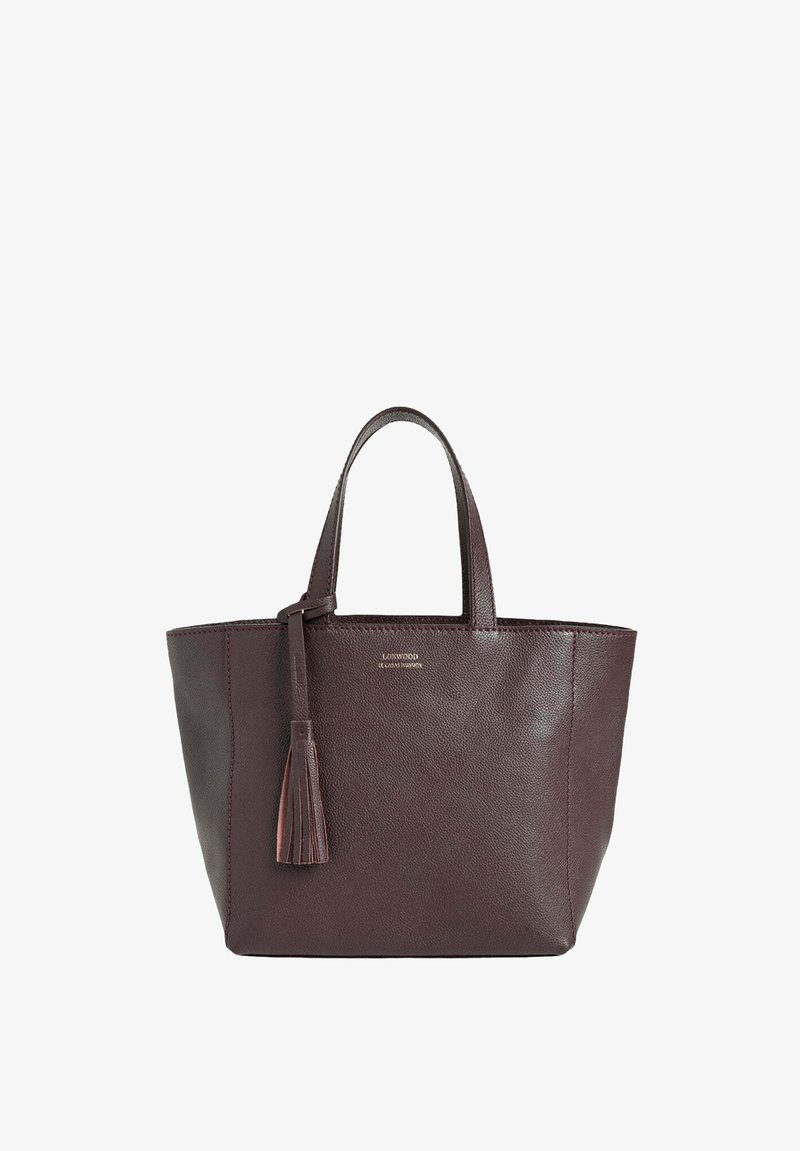 Sac en cuir marron foncé avec deux poignées et un détail de pampille suspendu à une des poignées, sur fond blanc.